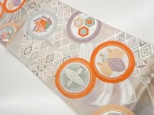 いづくら製　佐賀錦束ね熨斗に丸文・向かい鶴・蝶模様織出し袋帯